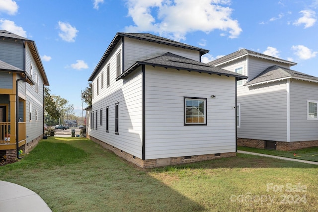 view of home's exterior featuring a yard