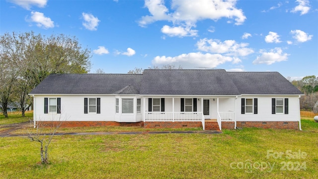 view of front of home featuring a porch and a front lawn