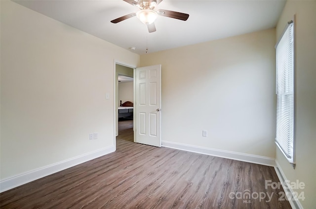 unfurnished bedroom featuring ceiling fan and light wood-type flooring