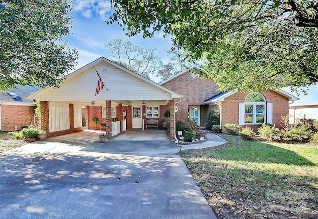 view of front of house featuring a carport