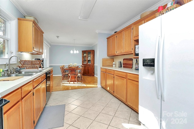 kitchen with crown molding, sink, white refrigerator with ice dispenser, decorative light fixtures, and light hardwood / wood-style flooring