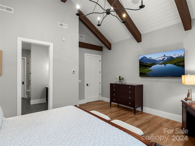 bedroom with beamed ceiling, high vaulted ceiling, hardwood / wood-style floors, a chandelier, and wood ceiling