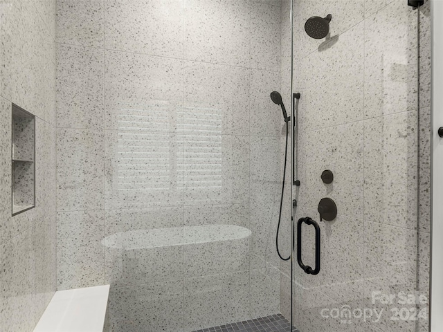 bathroom with an enclosed shower