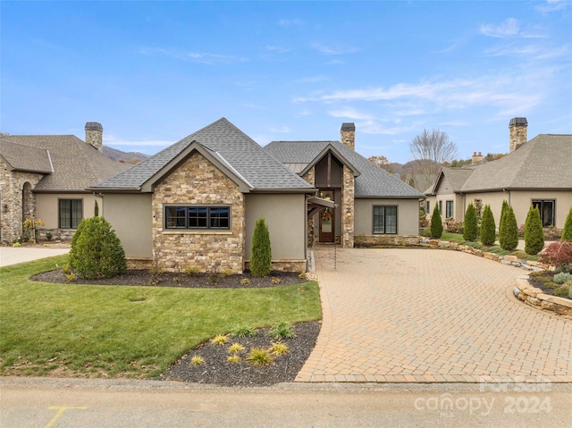 view of front of house with a front lawn