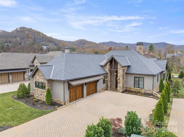 view of front of home with a mountain view