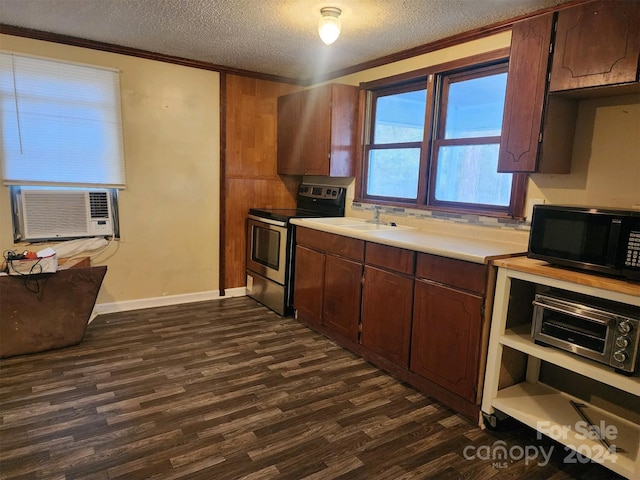 kitchen with electric stove, crown molding, dark hardwood / wood-style floors, a textured ceiling, and dark brown cabinets