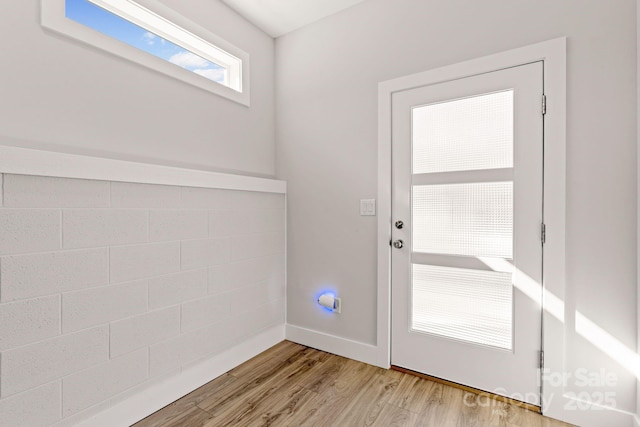 doorway featuring light wood-type flooring