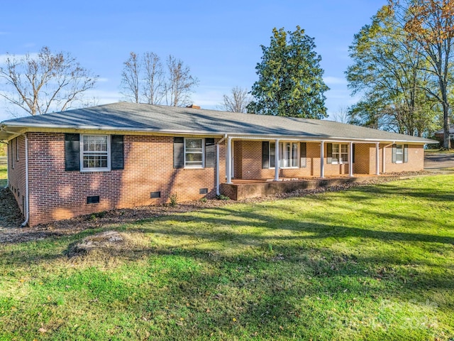 ranch-style home with a front lawn and a porch