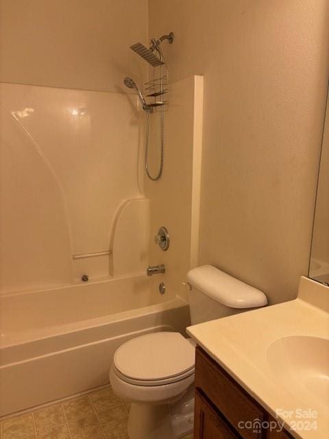 full bathroom featuring tile patterned flooring, vanity, toilet, and shower / washtub combination