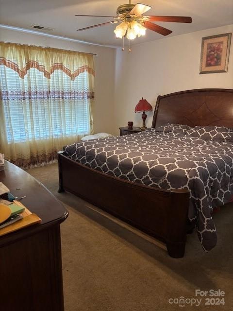 bedroom featuring carpet floors and ceiling fan