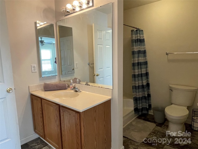 full bathroom with shower / tub combo, vanity, toilet, and ceiling fan