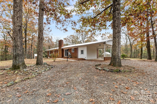 view of front facade featuring a carport