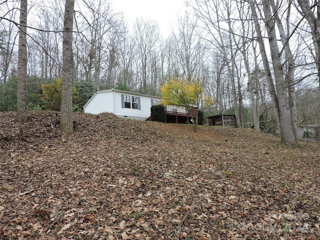 view of yard with a deck