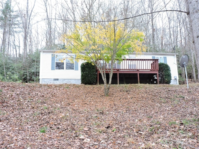 2271 Gouges Creek Rd, Spruce Pine, NC 28777 - manufactured / mobile home with crawl space and a wooden deck