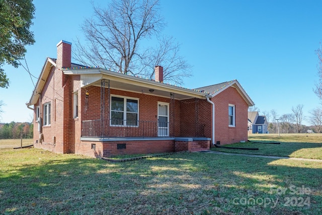 exterior space featuring a yard