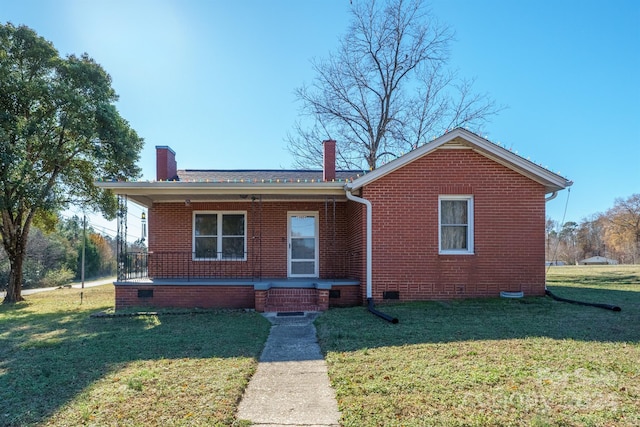 bungalow with a front lawn