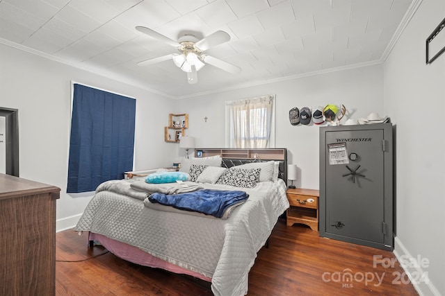 bedroom featuring ceiling fan, dark hardwood / wood-style flooring, and ornamental molding