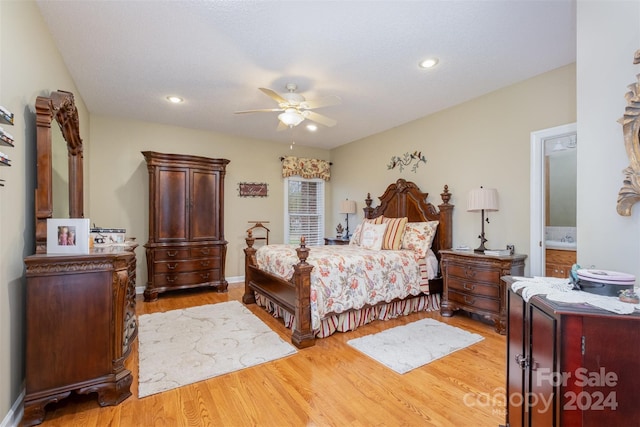 bedroom with light hardwood / wood-style floors and ceiling fan