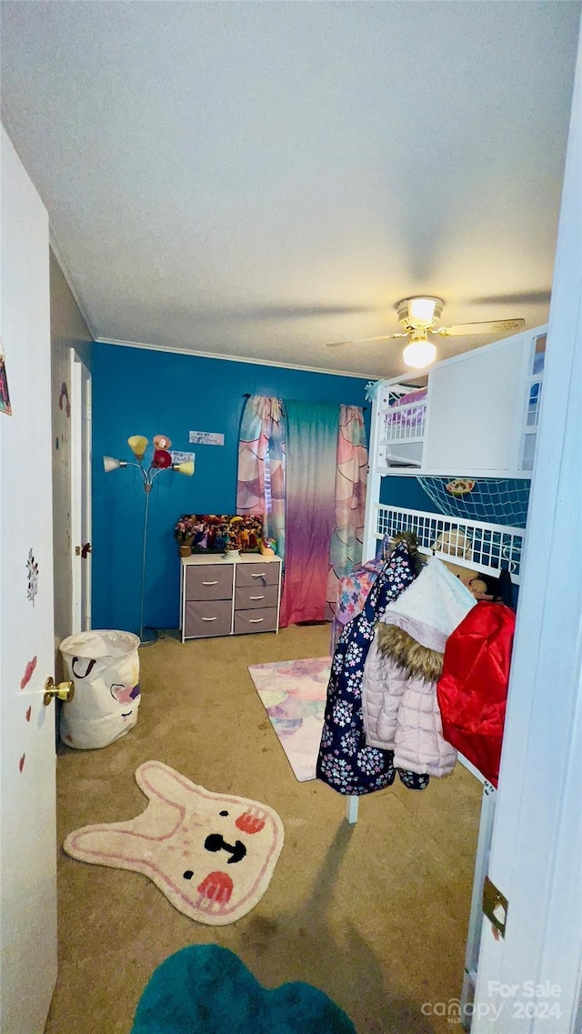 carpeted bedroom with ceiling fan