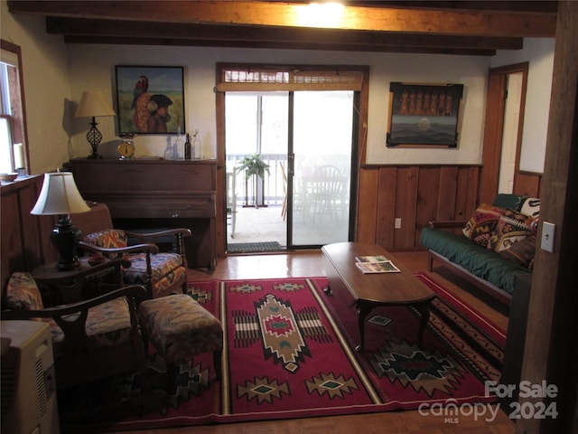 living room with beamed ceiling