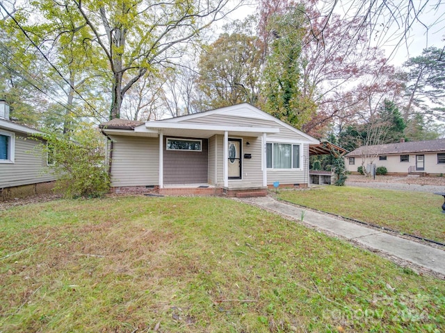 view of front facade with a front yard