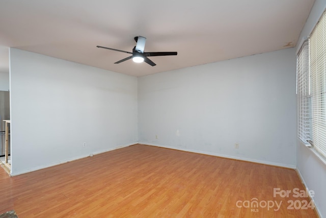 unfurnished room featuring light wood-type flooring