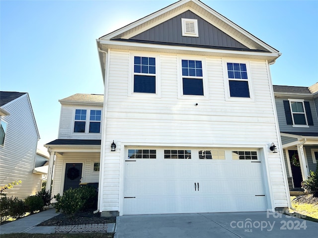 view of front of property with a garage