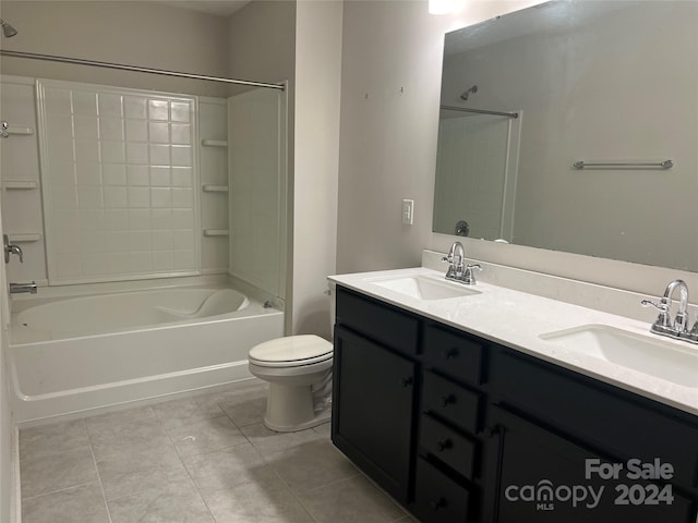 full bathroom featuring tile patterned flooring, vanity, toilet, and shower / tub combination