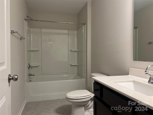 full bathroom with tile patterned flooring, vanity, shower / bath combination, and toilet