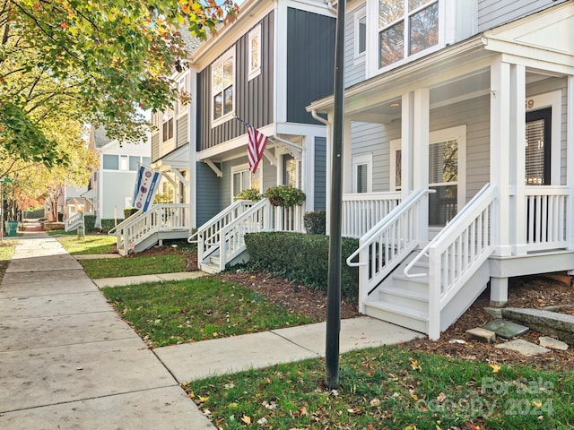 view of property exterior featuring a porch