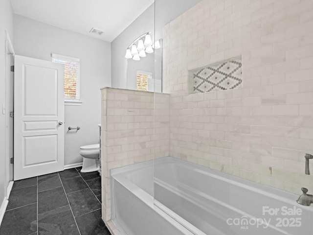 bathroom with a bath, visible vents, tile patterned floors, and toilet