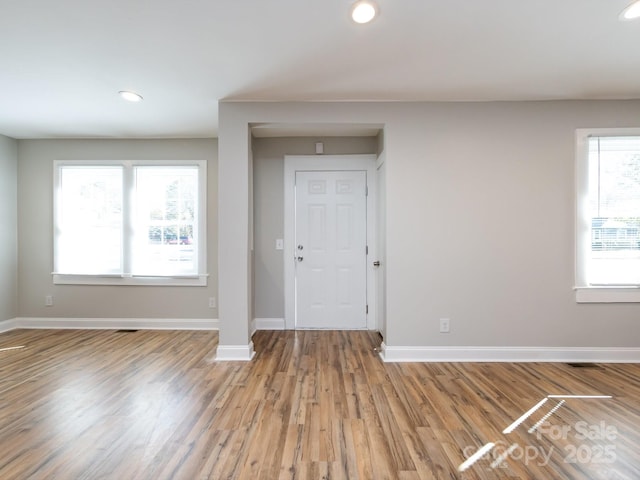 foyer with light wood-type flooring