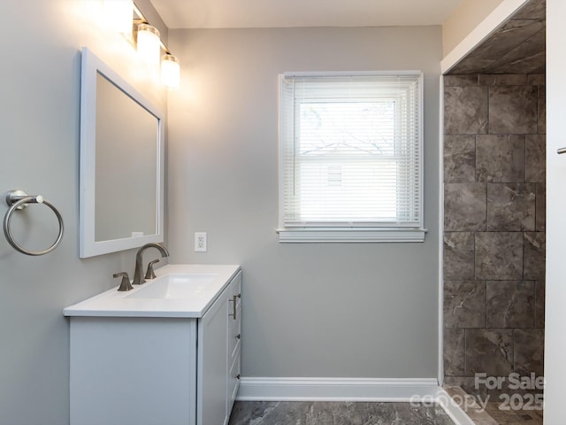 bathroom with vanity and walk in shower