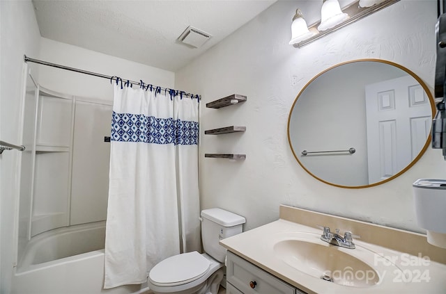 full bathroom with vanity, toilet, shower / bathtub combination with curtain, and a textured ceiling