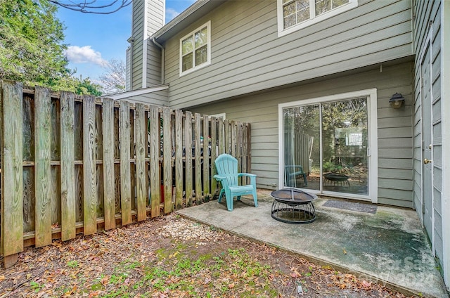 view of patio / terrace featuring a fire pit