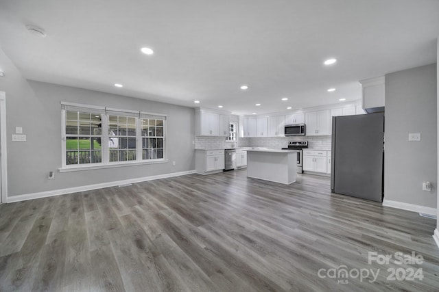 unfurnished living room featuring light wood-type flooring