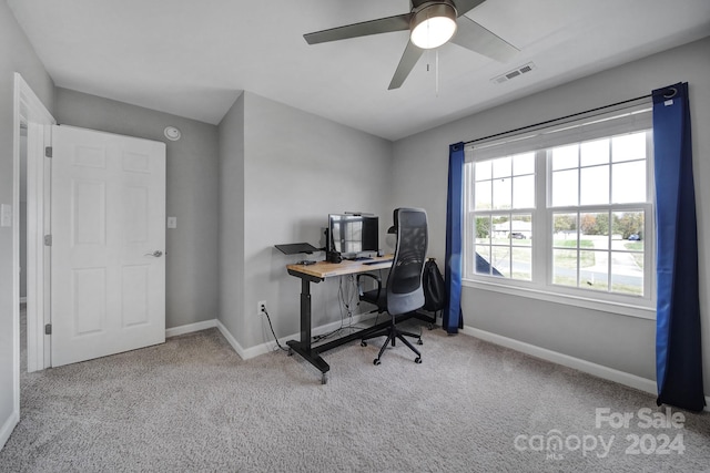 office area featuring ceiling fan and light colored carpet