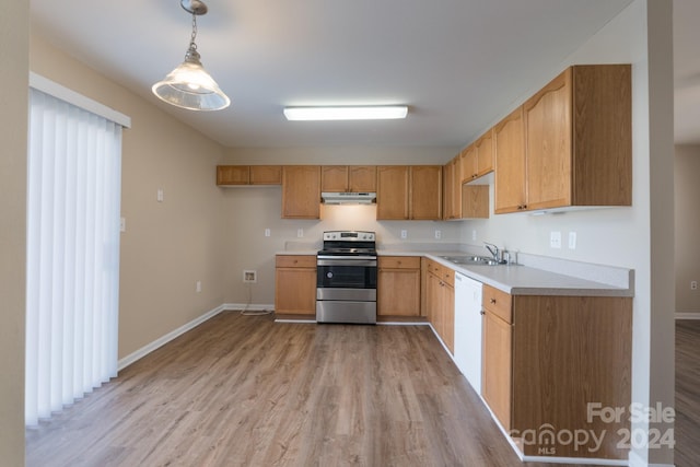 kitchen with pendant lighting, stainless steel electric stove, white dishwasher, sink, and light wood-type flooring