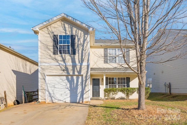 front of property featuring a garage