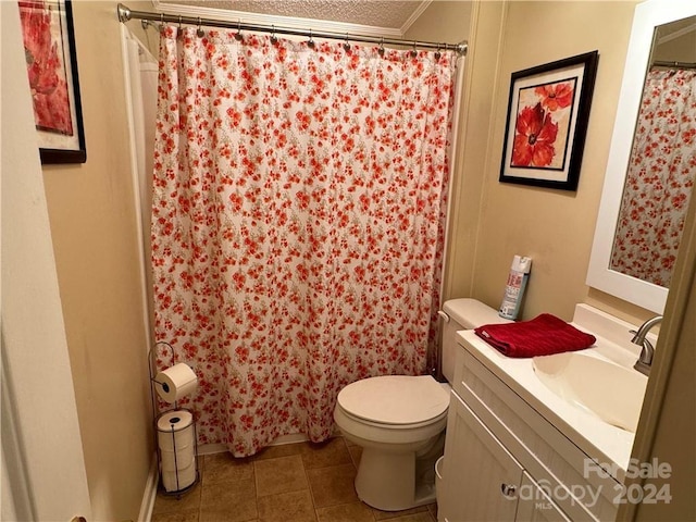 bathroom with vanity, toilet, and walk in shower