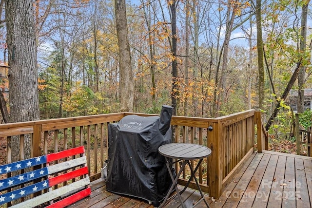 wooden deck featuring grilling area