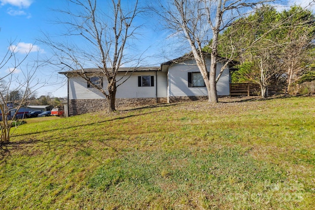 exterior space featuring a lawn