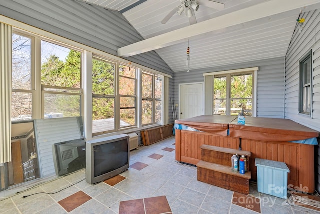 sunroom with vaulted ceiling with beams, ceiling fan, and a hot tub