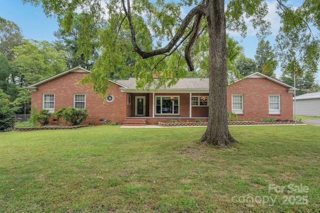 single story home featuring a front yard and covered porch