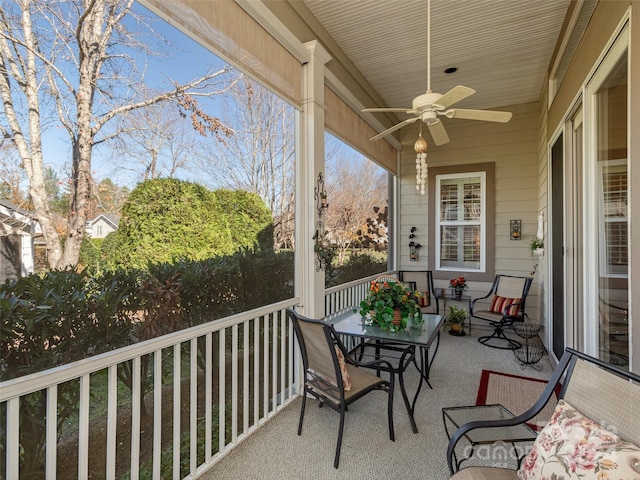 exterior space with ceiling fan