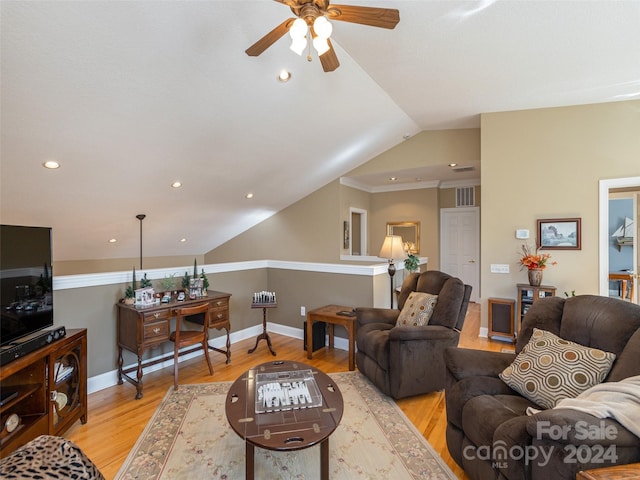 living room with light hardwood / wood-style flooring, ceiling fan, lofted ceiling, and crown molding