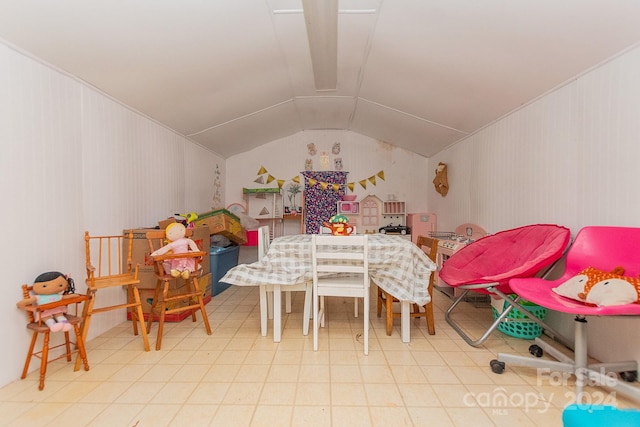 recreation room featuring vaulted ceiling