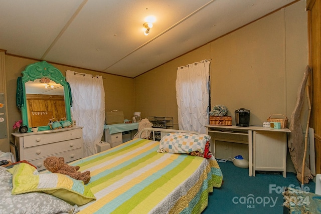 carpeted bedroom with lofted ceiling