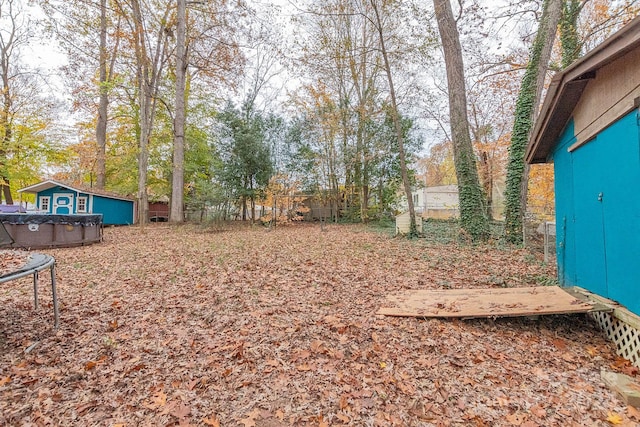 view of yard featuring a trampoline