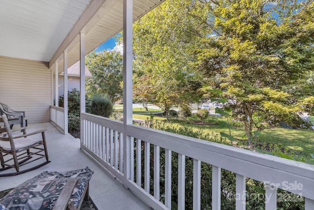 balcony featuring a porch